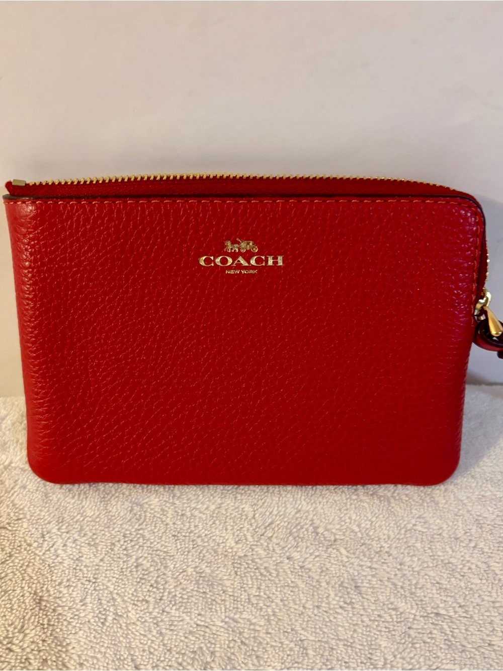 Coach Red Pebbled Leather Wrist Pouch with Gold Logo
